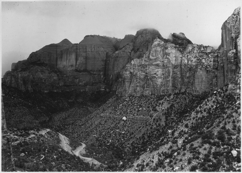Horizontal view northwest from third gallery of Zion Tunnel, looking toward Zion Canyon. Sentinel, right center... - NARA - 520398