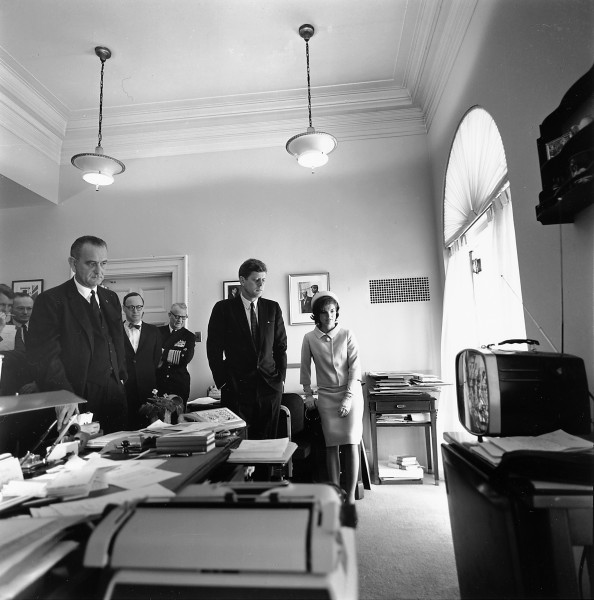 Kennedy, Johnson, and others watching flight of Astronaut Shepard on television, 05 May 1961