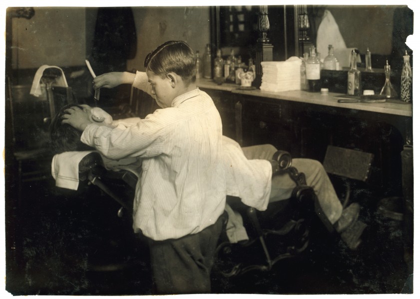 Lewis Hine, Frank De Natale, 12-year old barber, Boston, 1917
