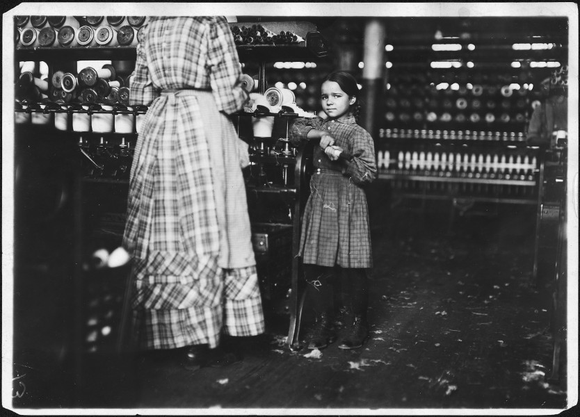 Little Fannie, 7 years old, 48 inches high, helps sister in Elk Cotton Mill. Her sister said, 