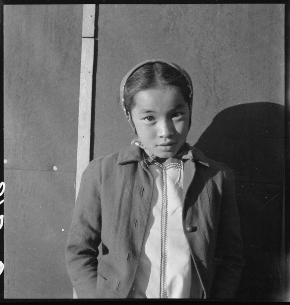Manzanar Relocation Center, Manzanar, California. A young evacuee of Japanese ancestry at this War . . . - NARA - 538013