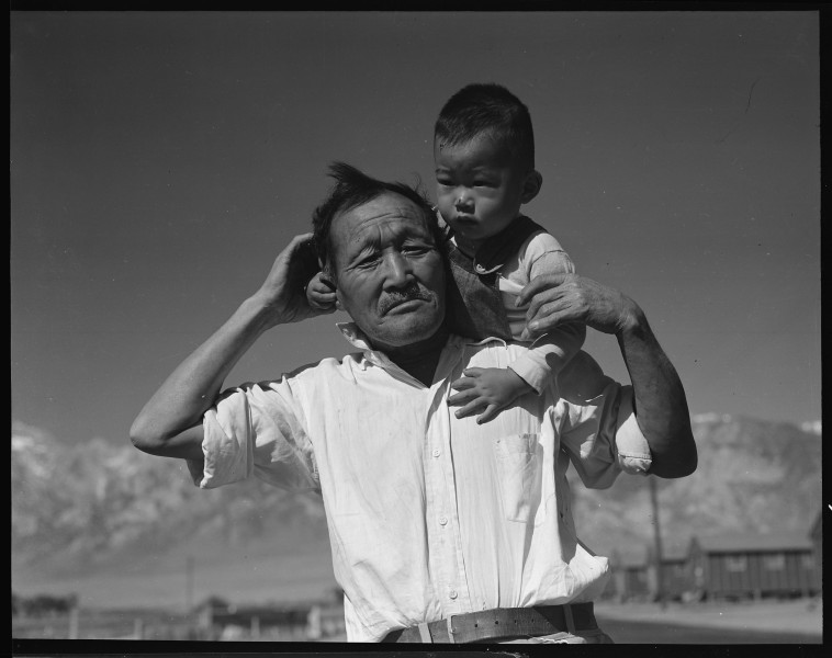 Manzanar Relocation Center, Manzanar, California. Grandfather and grandson of Japanese ancestry at . . . - NARA - 537992
