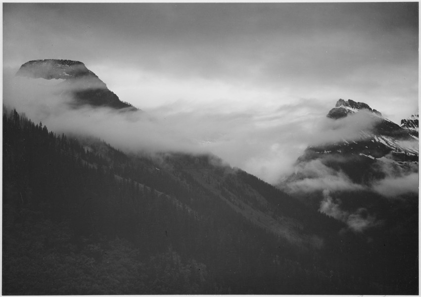 Mountain partially covered with clouds, 