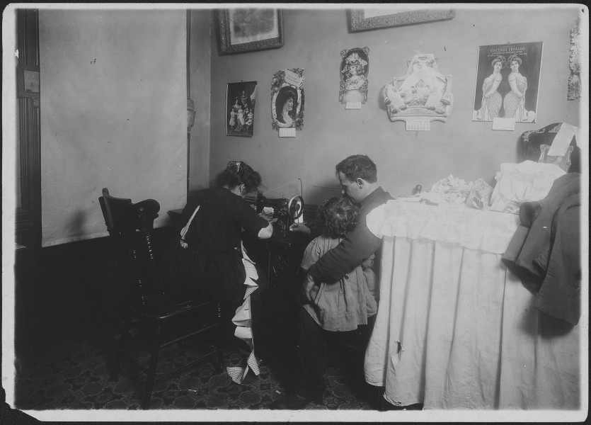 Mrs. Ricca, making rompers for Campbell kids. Husband out of work. New York City. - NARA - 523504