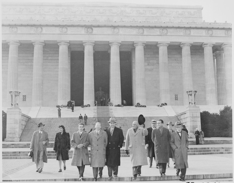 Photograph of a group of unidentified dignitaries outside the Lincoln Memorial in Washington. - NARA - 199497