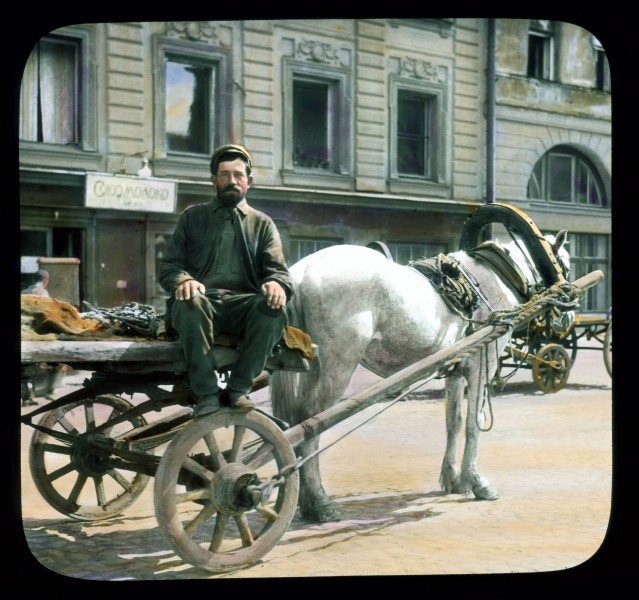 Saint Petersburg street scene, man with a horse-drawn cart