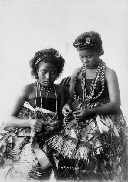 Samoan women in traditional clothing, making wreaths, ca. 1890s