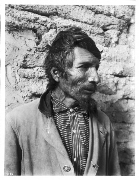 Sancristan at wall of Mission Tumacacori, Arizona, ca.1908 (CHS-4194)