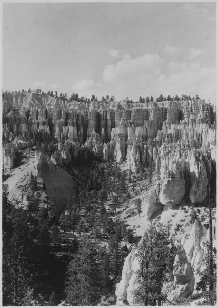 View north to Sunrise Point and foot of Comanche Trail from Cathedral Ridge. - NARA - 520277