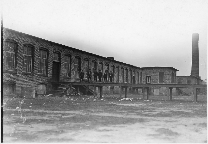 View of the Scotland Mills. All these boys work in mill. Laurinburg, N.C. - NARA - 523135