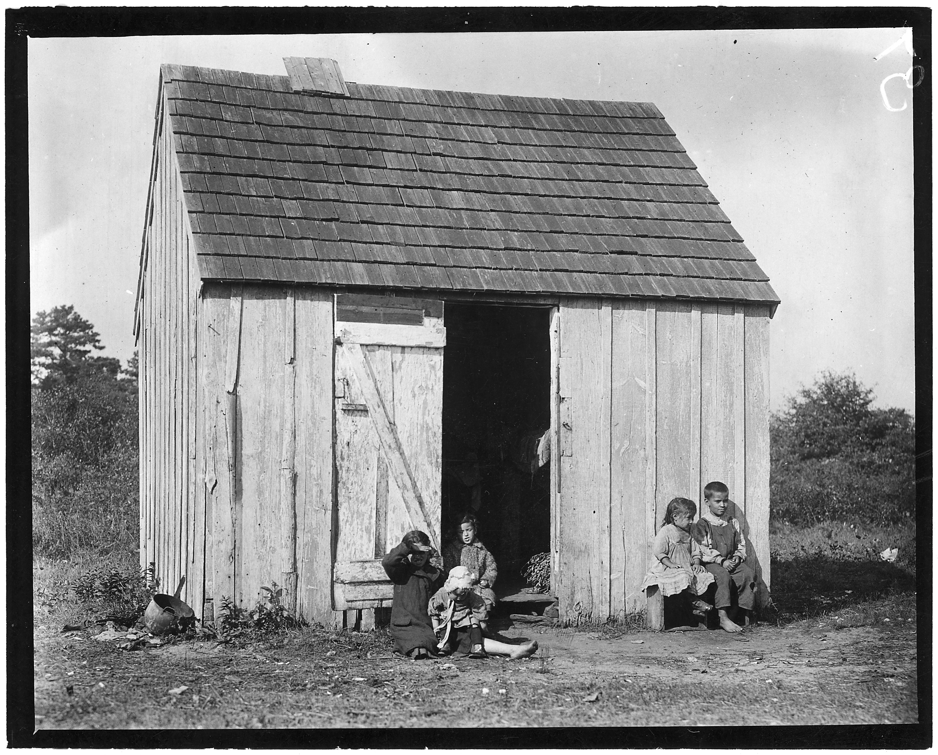 Small shack on Forsythe's Bog occupied by DeMarco family, 10 in the family living in this one room. Room is 10 feet x... - NARA - 523268