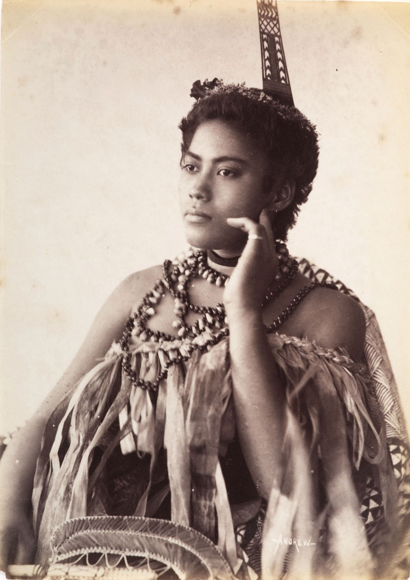 Thinking Woman, portrait of an unidentified Samoan woman wearing a cloak type garment