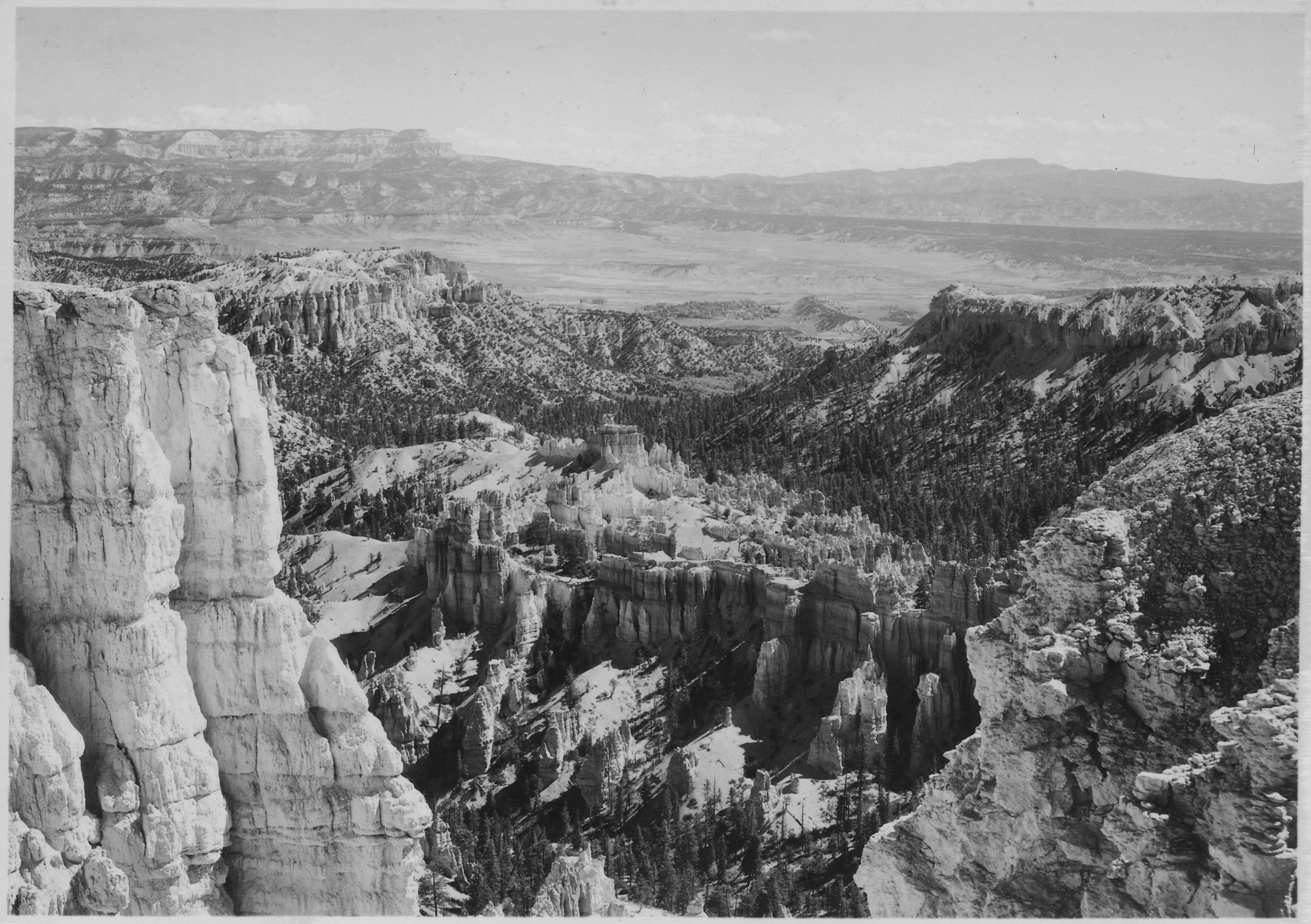 View east from Inspiration Point, rim of Bryce Canyon, showing Bryce Temple Ridge, the foot of the Canyon, the... - NARA - 520227