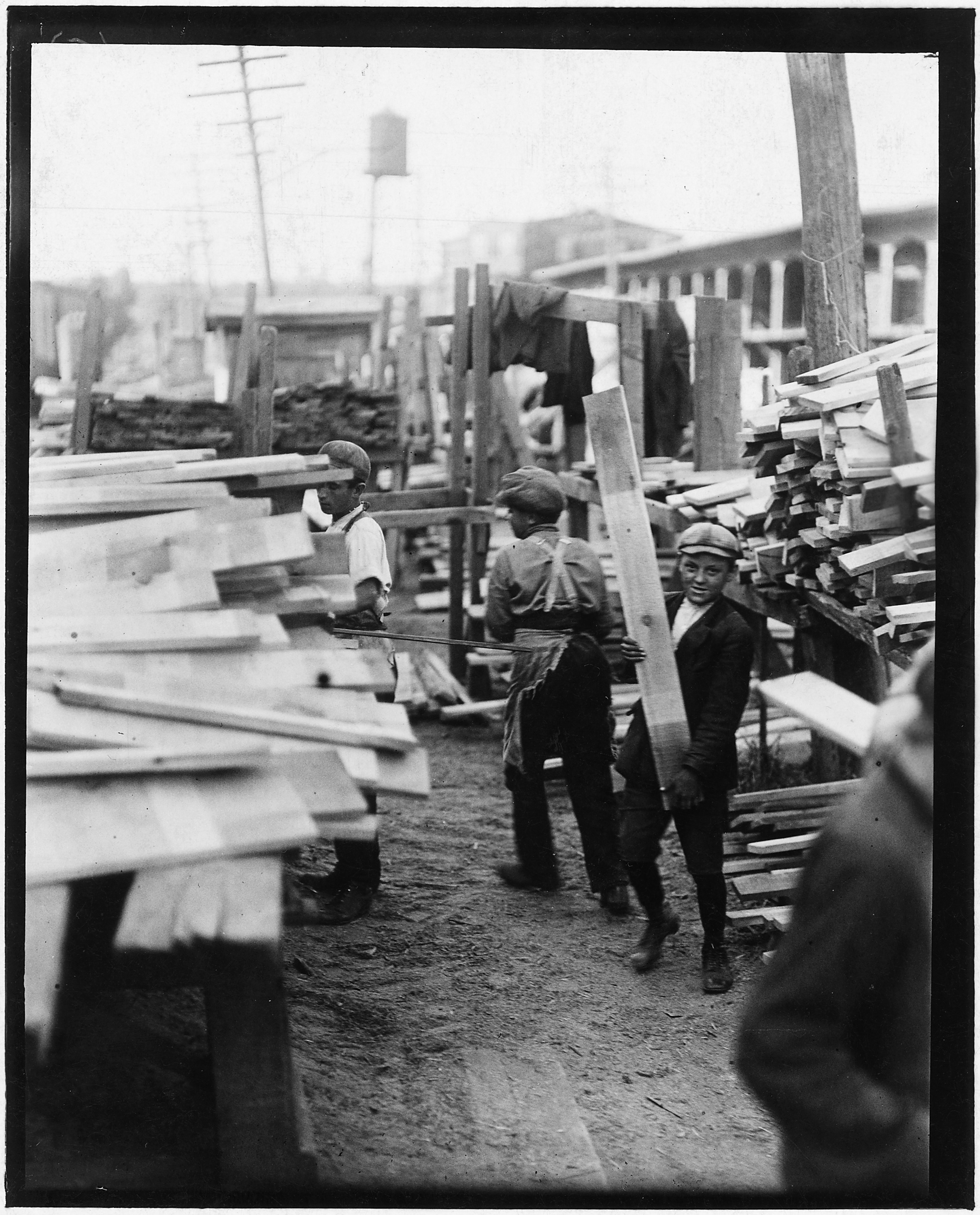 Young boy working for Hickok Lumber Co. Burlington, Vt. - NARA - 523252
