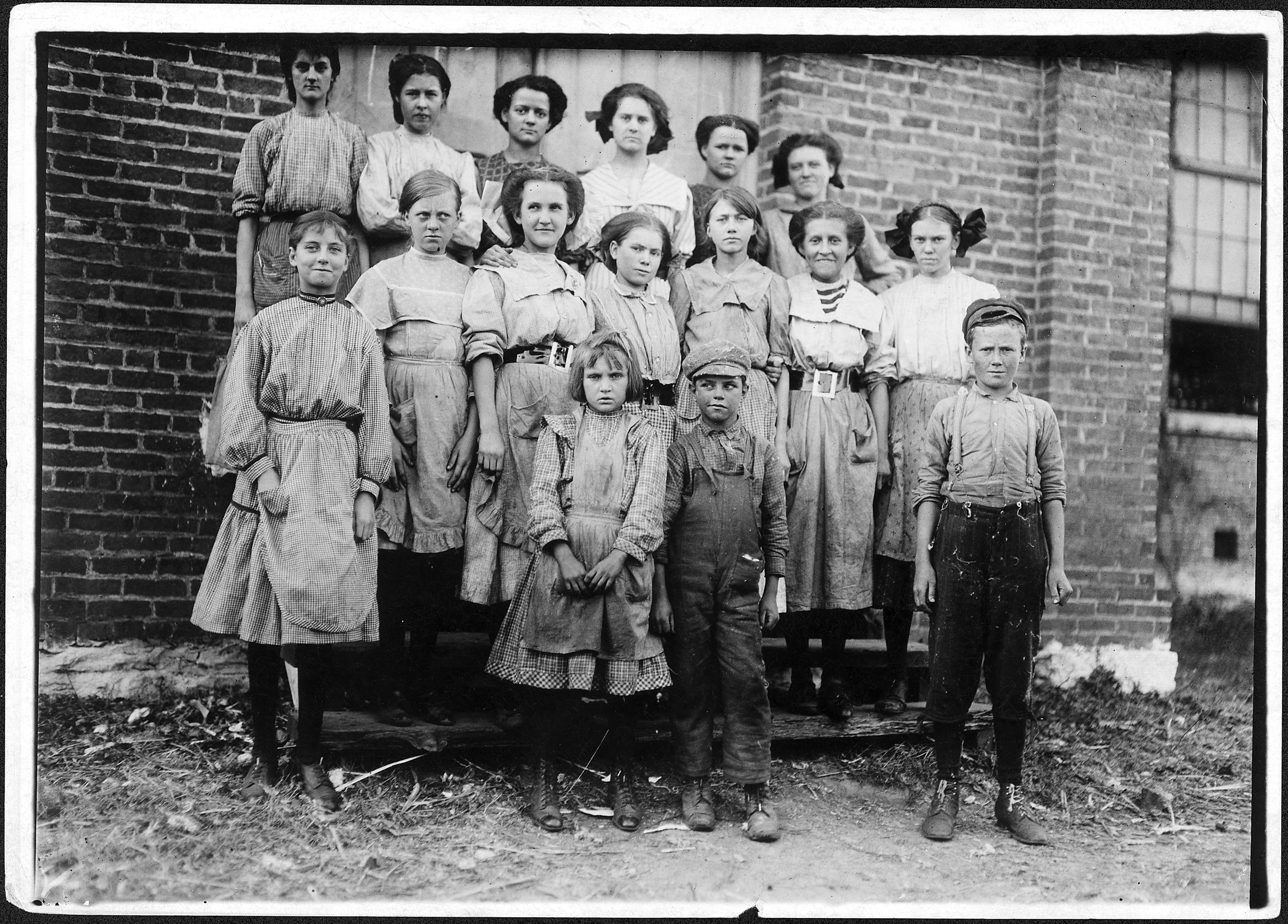 Young spinners in Elk Cotton Mills. Youngest girl hardly knew her name. Youngest boy runs two sides at ten cents each... - NARA - 523348