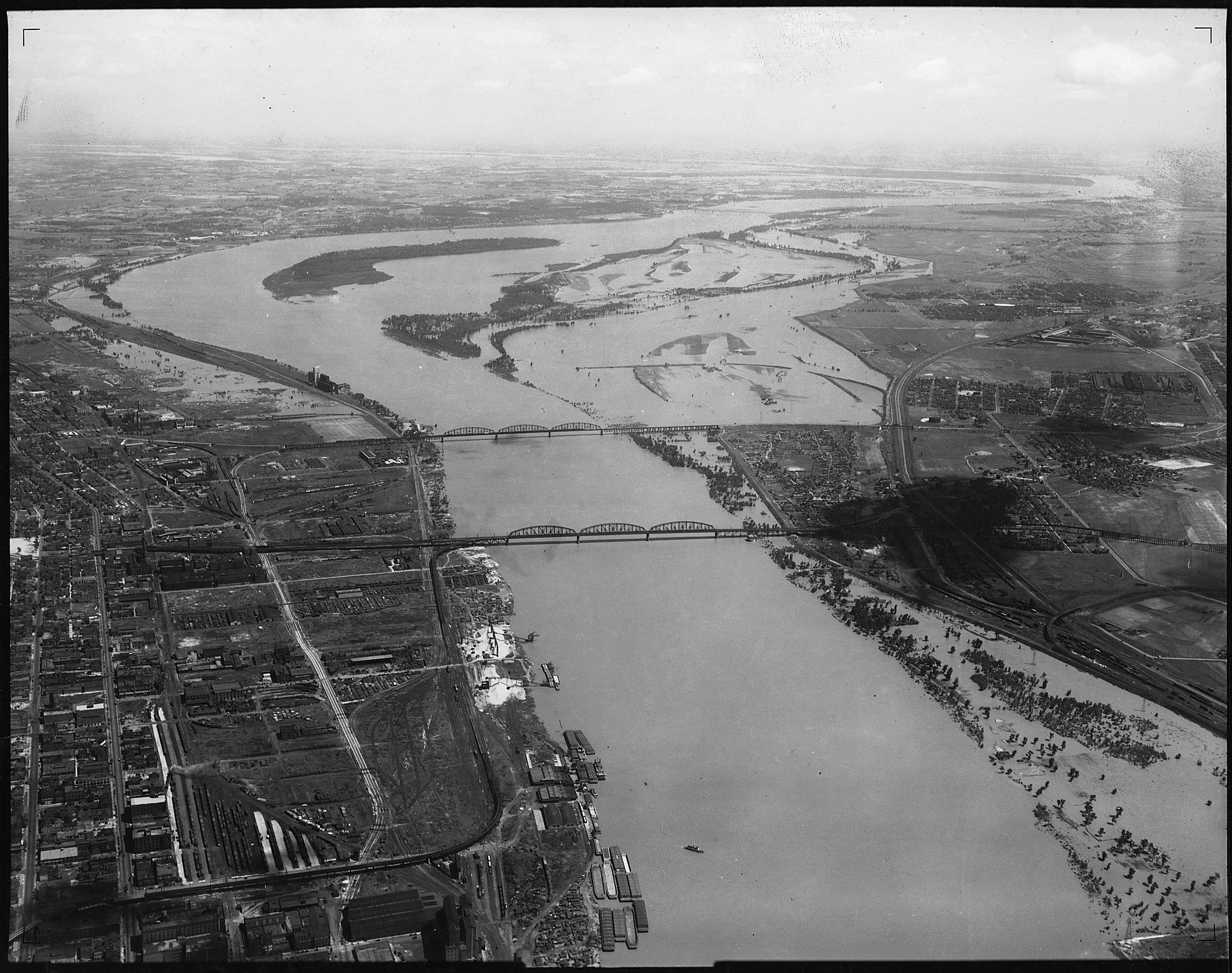 Aerial photograph of flood, unidentified stretch of lower Mississippi River. - NARA - 285949