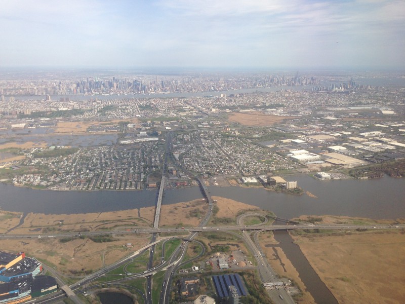 2014-05-07 16 23 15 View of New York City, Secaucus, New Jersey, the Hackensack River, the New Jersey Turnpike Western Spur and New Jersey Route 3 from an airplane heading for Newark Liberty International Airport