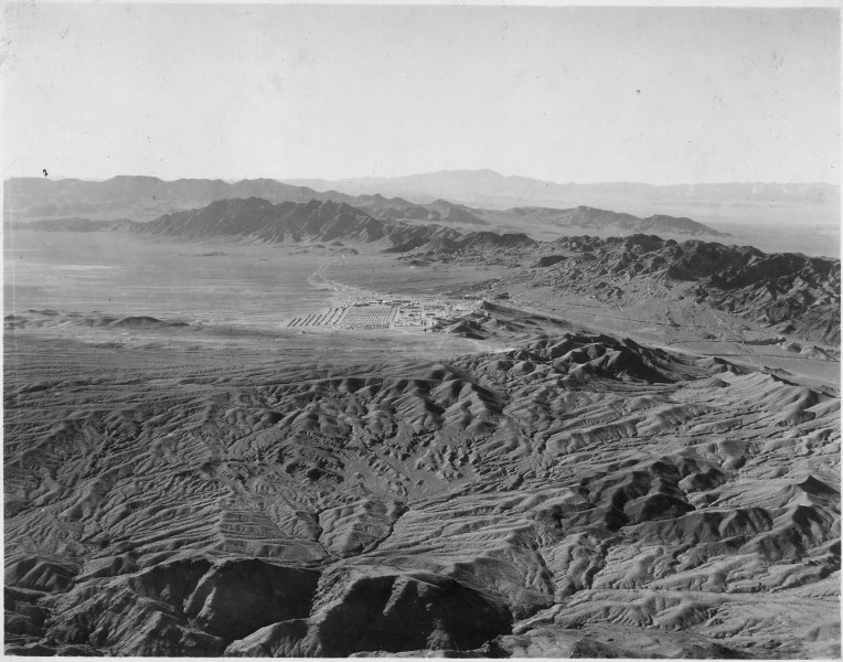 Aerial view of country in vicinity of Boulder Dam. Boulder City in distance, Babcock and Wilcox mill at right - NARA - 293835