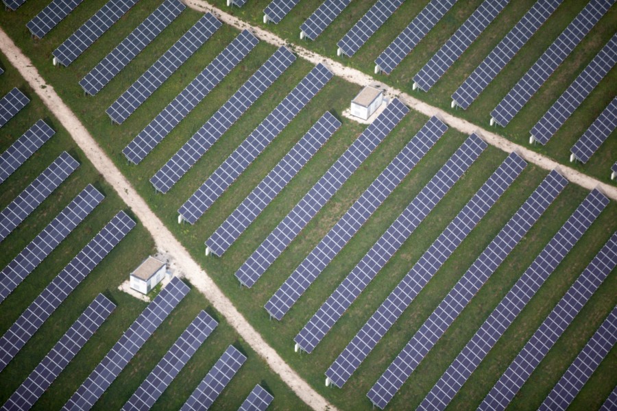 As soon as you fly accross the border into Germany, you see that solar power must be heavily subsidised there. Many fields like this. (9655865997)