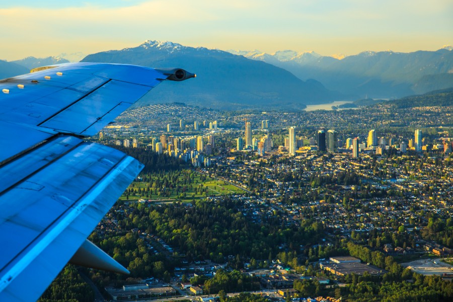 Flight from Kelowna to Whitehorse - Burnaby skyline with Indian Arm in the background (14468743012)