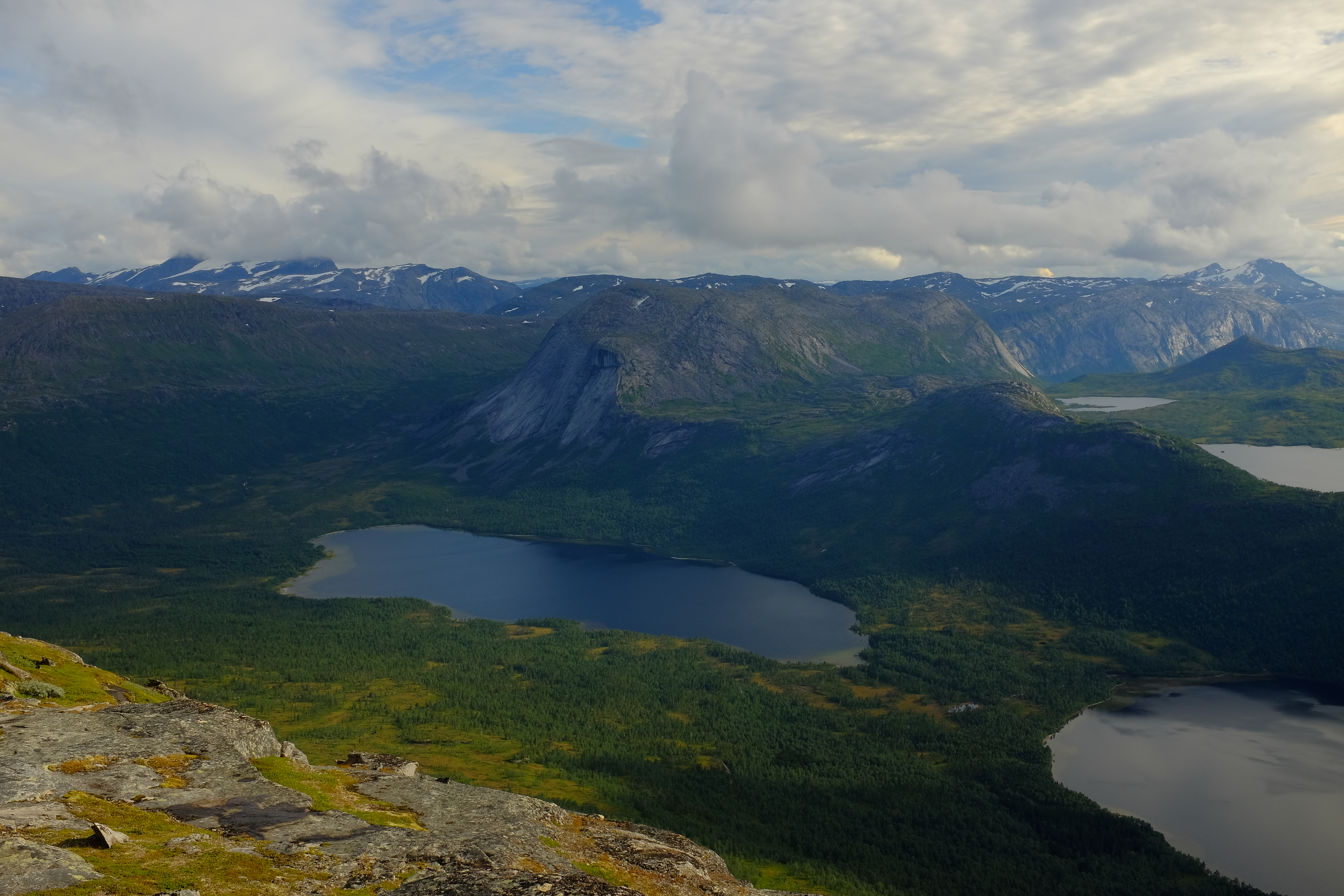 View from Kråkmotinden Mountain against Sjuenetvatnet lake in Sagvassdalen Nature Reserve