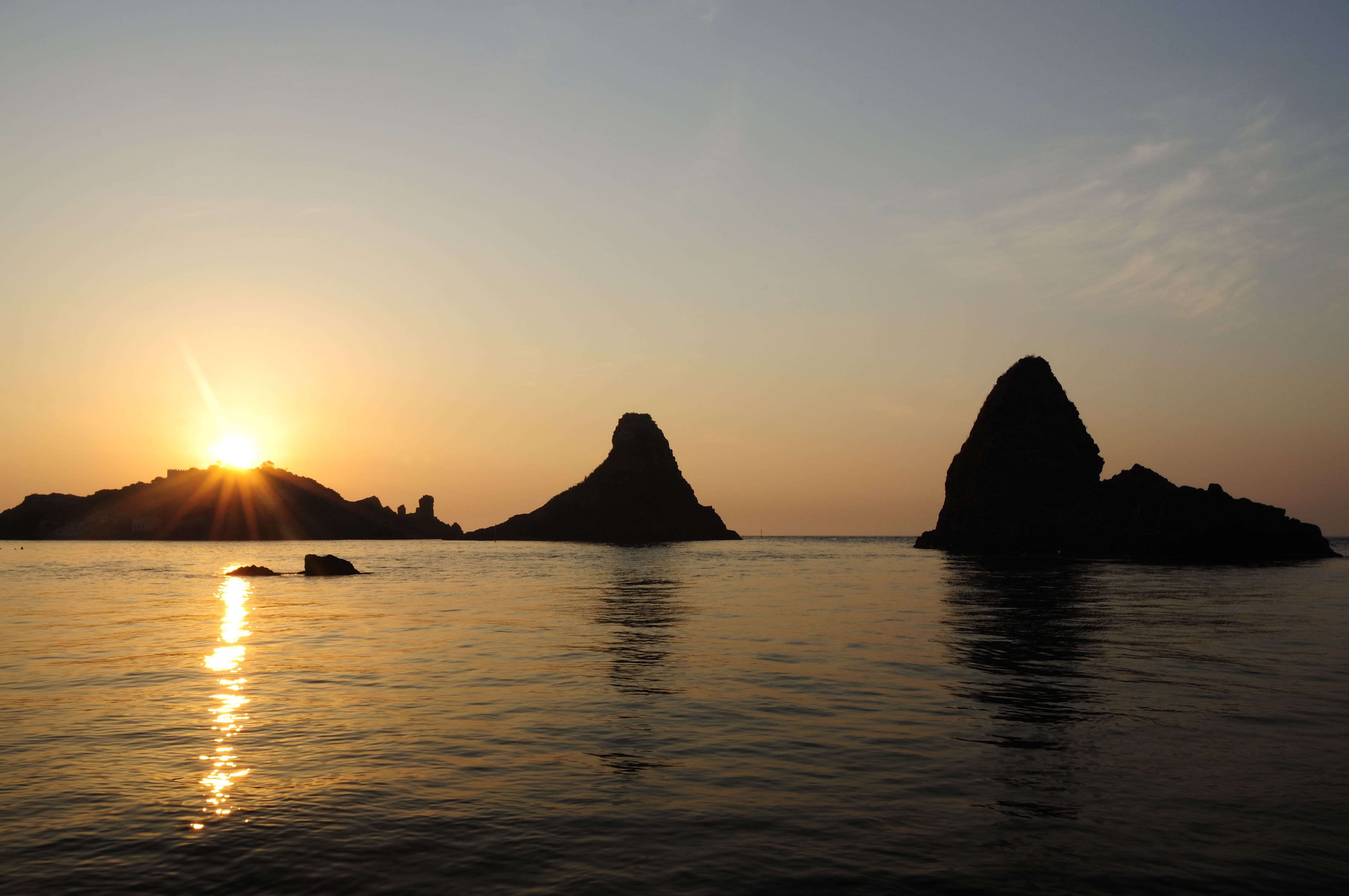 Islands of the Cyclops at Dawn Sicily Italy - Creative Commons by gnuckx (5040125477)