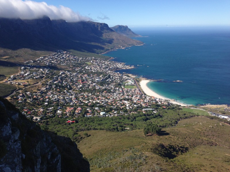 Rescue helicopter on Lions Head overlooking Camps Bay