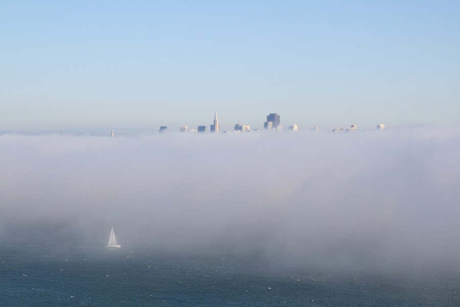 San Franciso in fog and sailboat