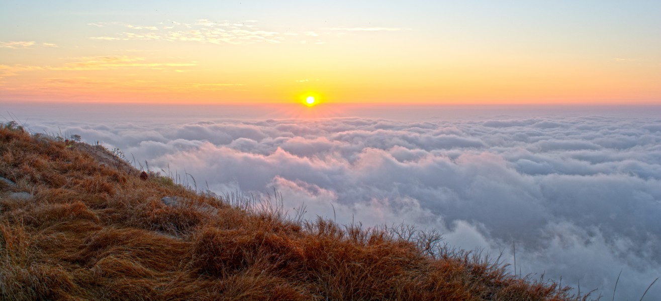 Sun rising from the blanket of clouds