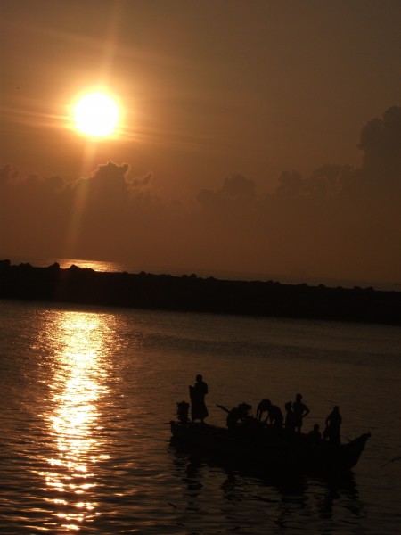The fishermen going to catch the fish in the early morining