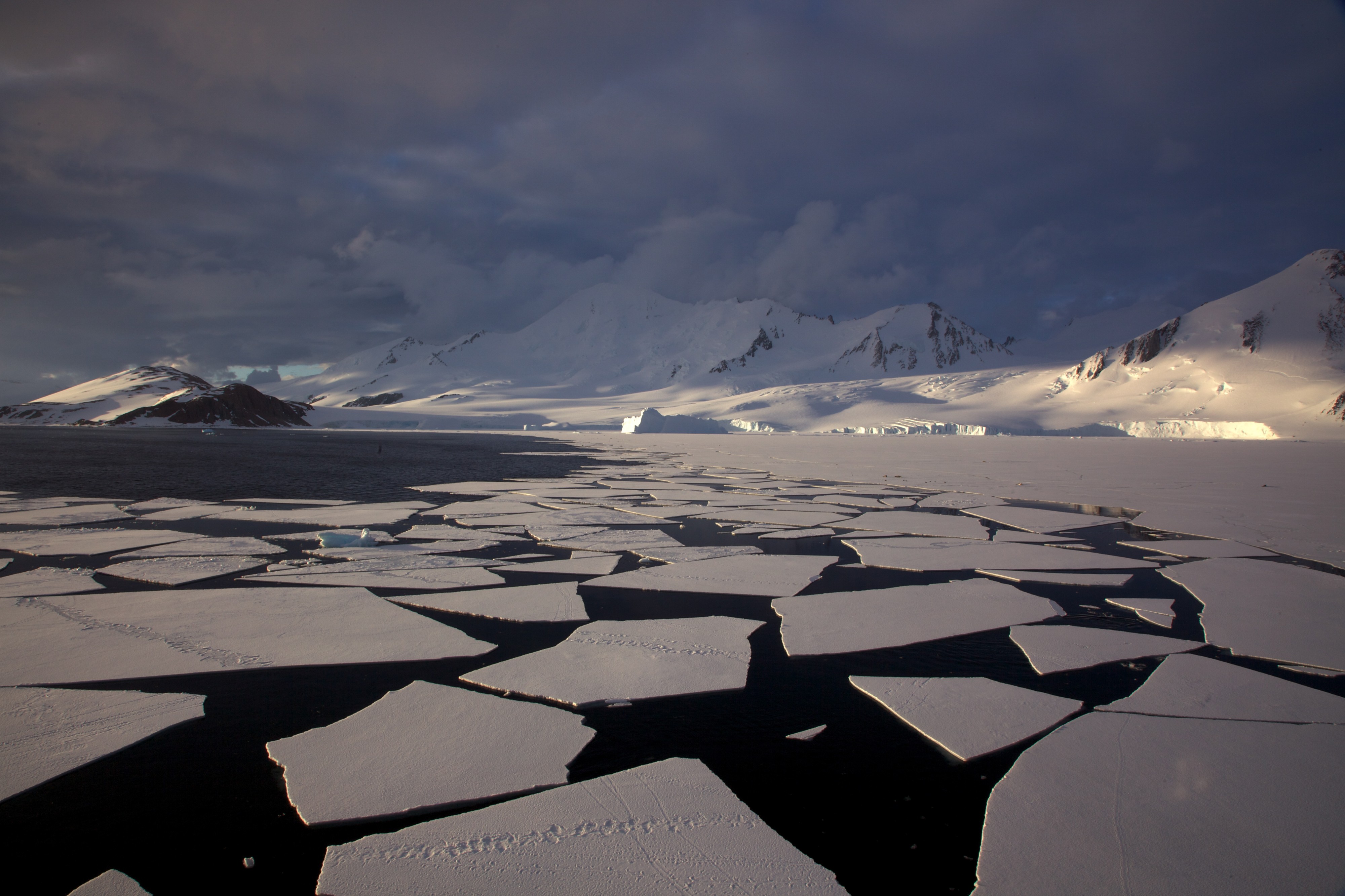 Antarctic mountains, pack ice and ice floes