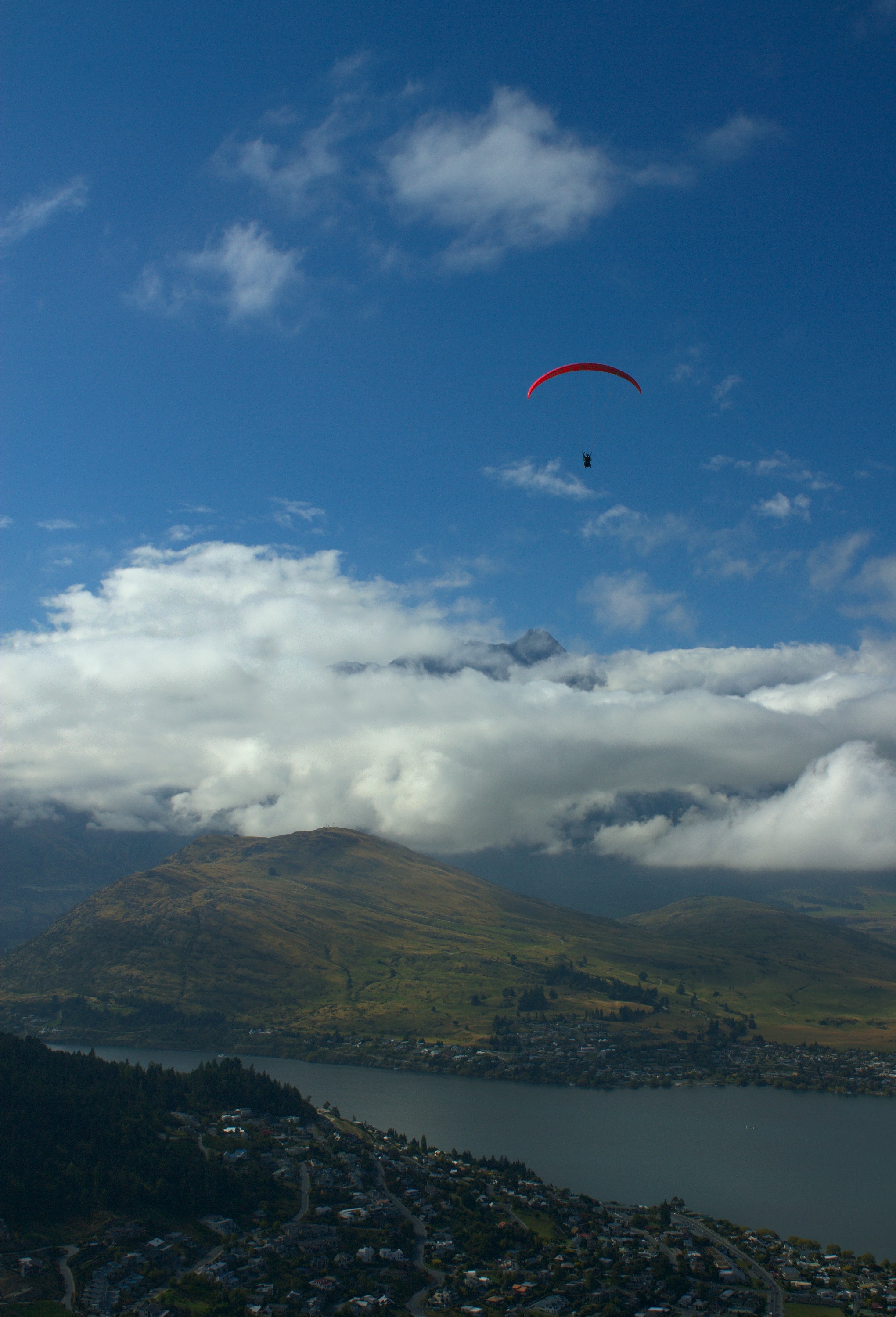Paragliding high above Queenstown