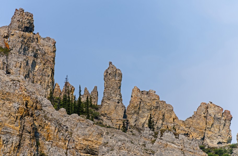 Rock crags atop cliff across from Muskeg Creek confluence with Firth River, Ivvavik National Park, YT