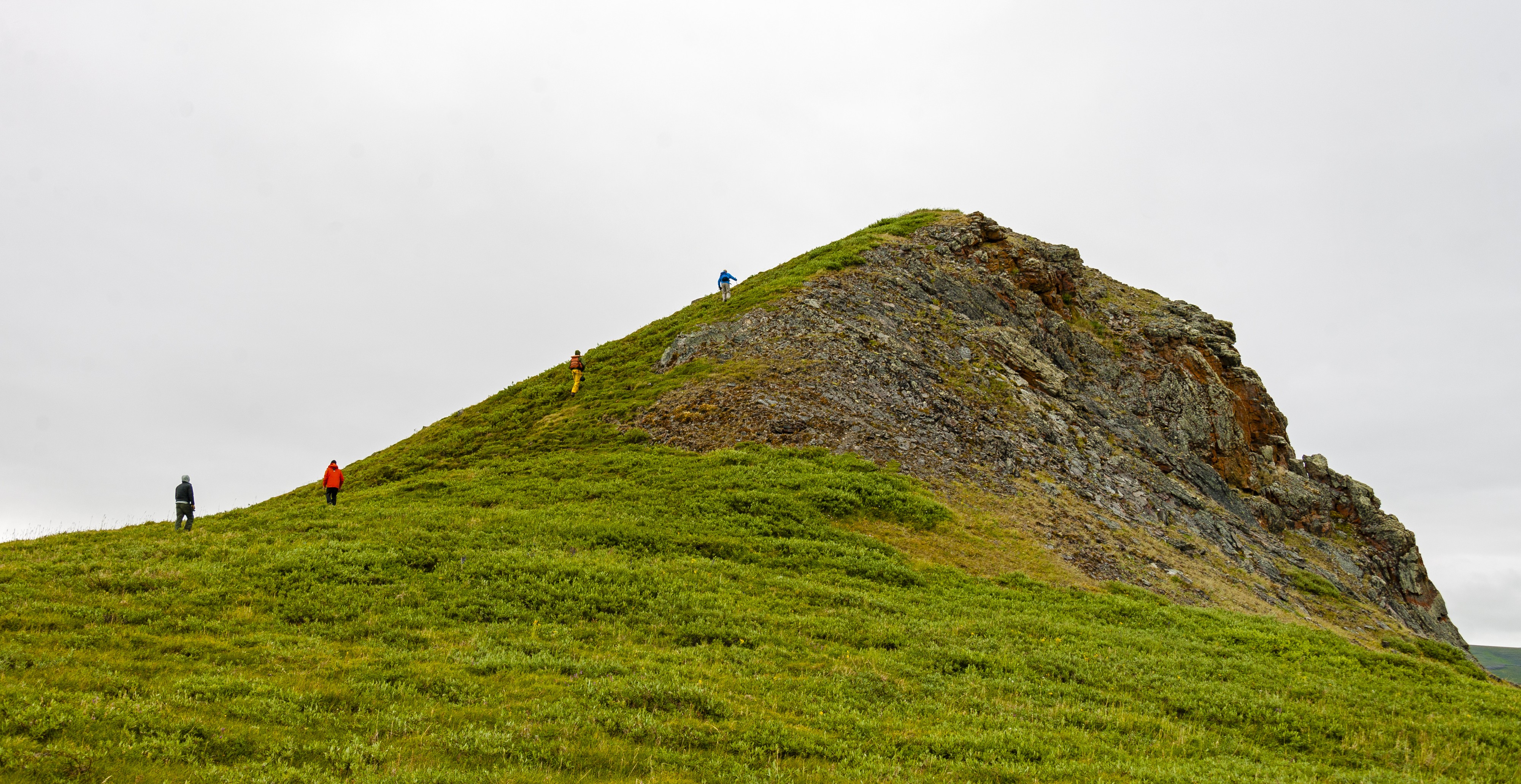Hikers climbing Engigstciak, Ivvavik National Park, YT