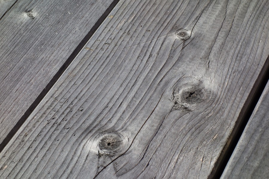 Weatherworn planks on top of wooden table