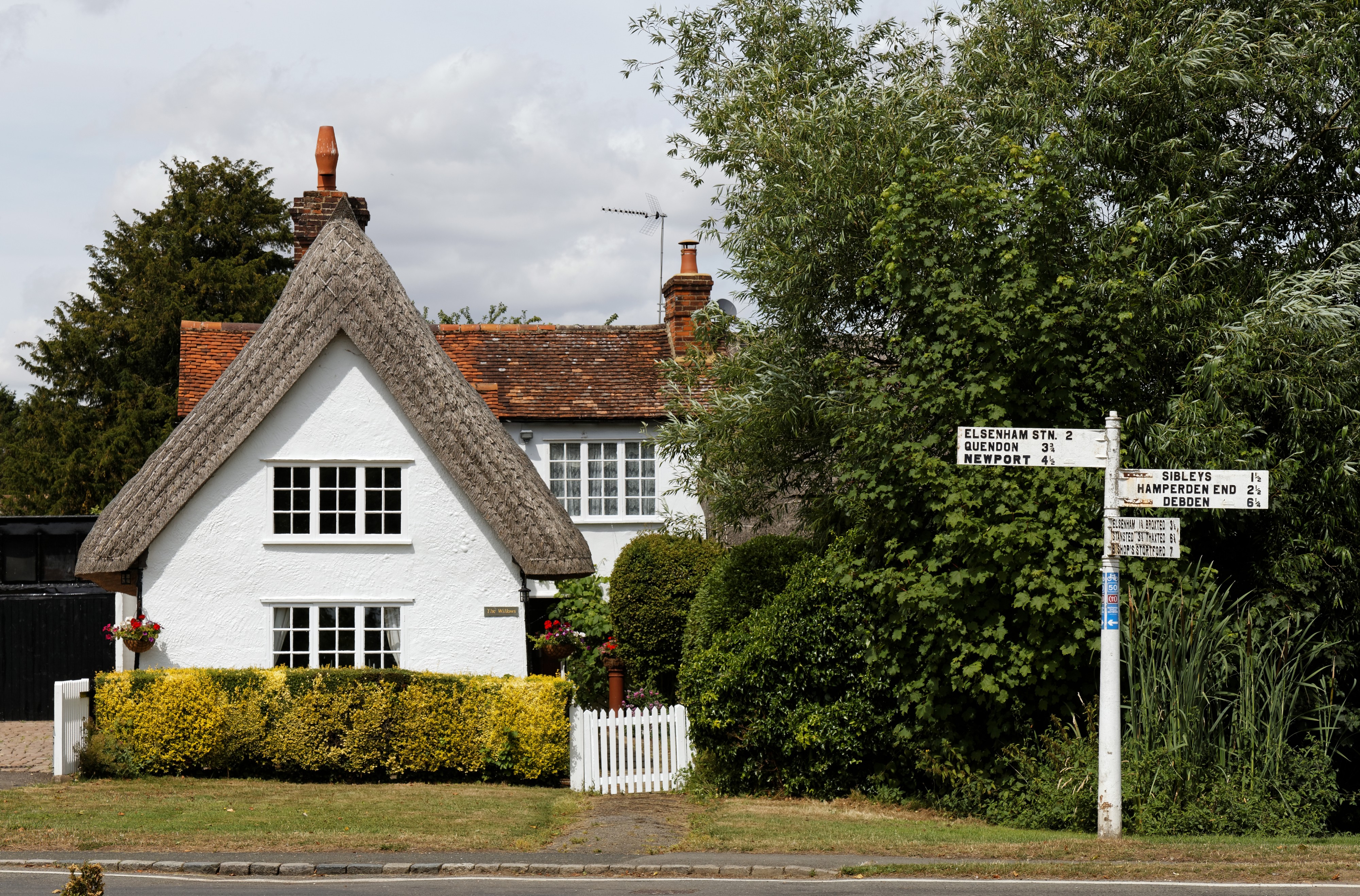Elsenham Debden fingerpost and house Henham Essex England