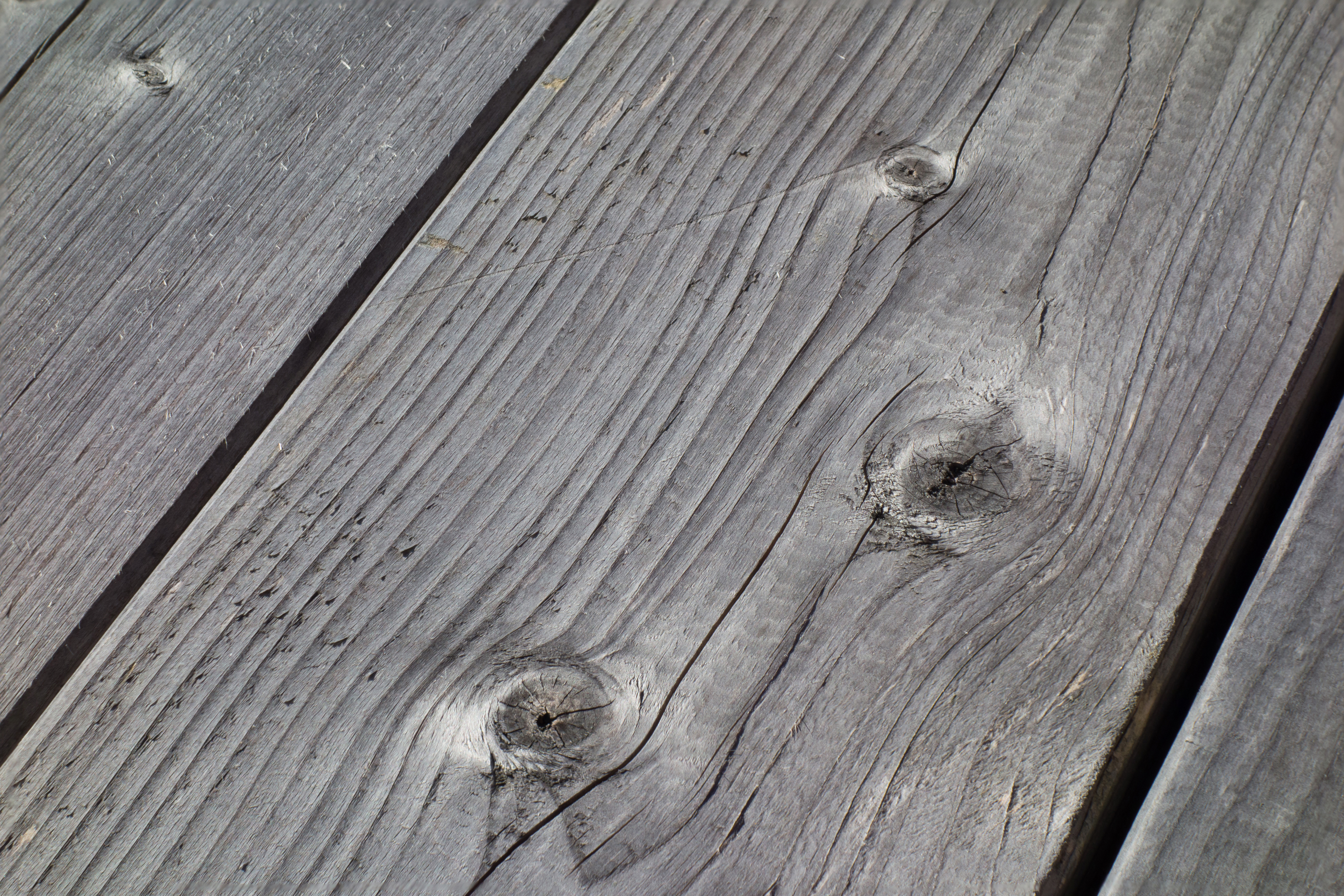 Weatherworn planks on top of wooden table
