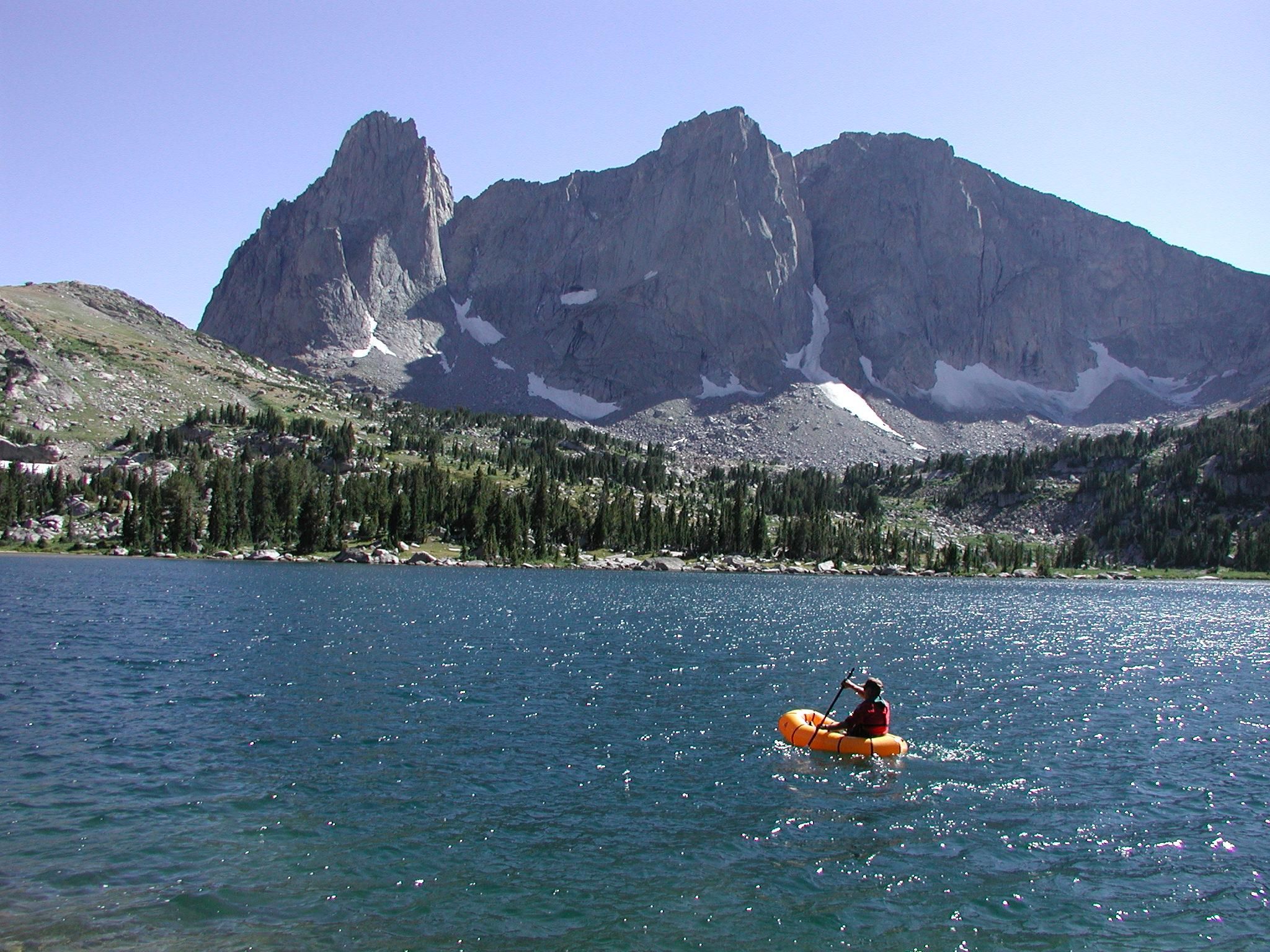 Biologist in raft during a fish population survey