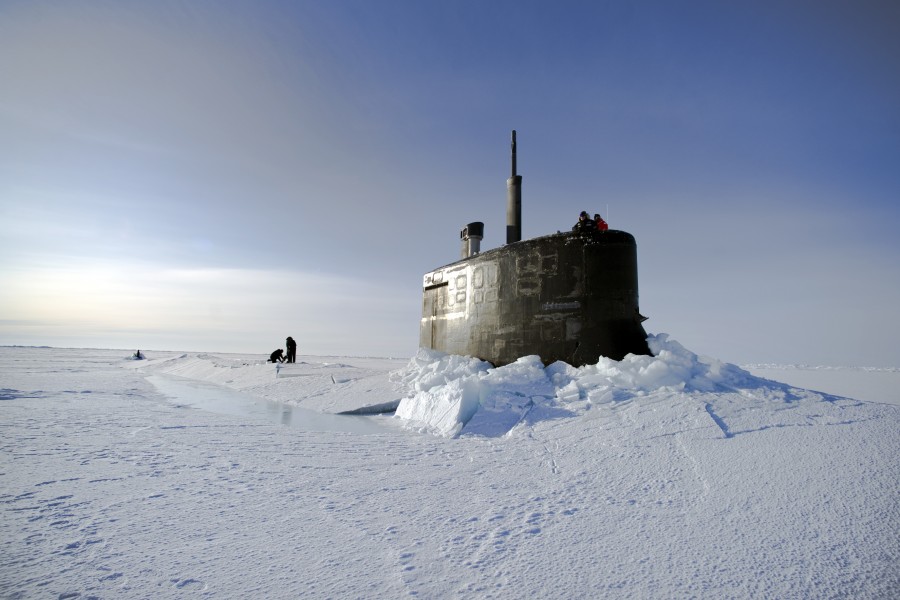 US Navy 110319-N-UH963-293 Sailors and members of the Applied Physics Laboratory Ice Station clear ice from the hatch of USS Connecticut (SSN 22)