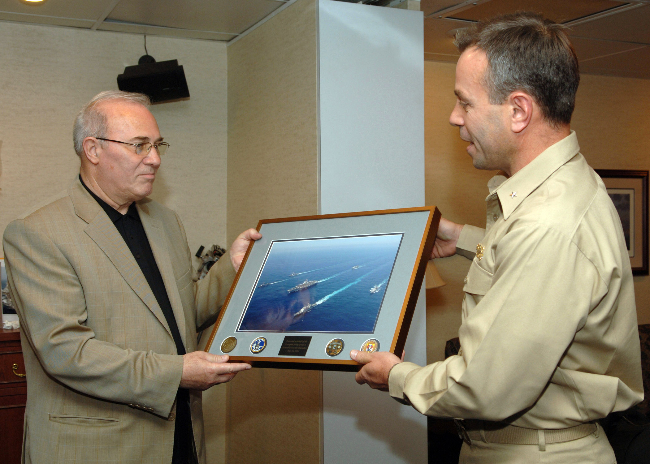 US Navy 060516-N-3396B-001 Rear Adm. Ray Spicer presents a goodwill gift to Bulgarian Minister of Defense the Honorable Vesselin Bliznakov