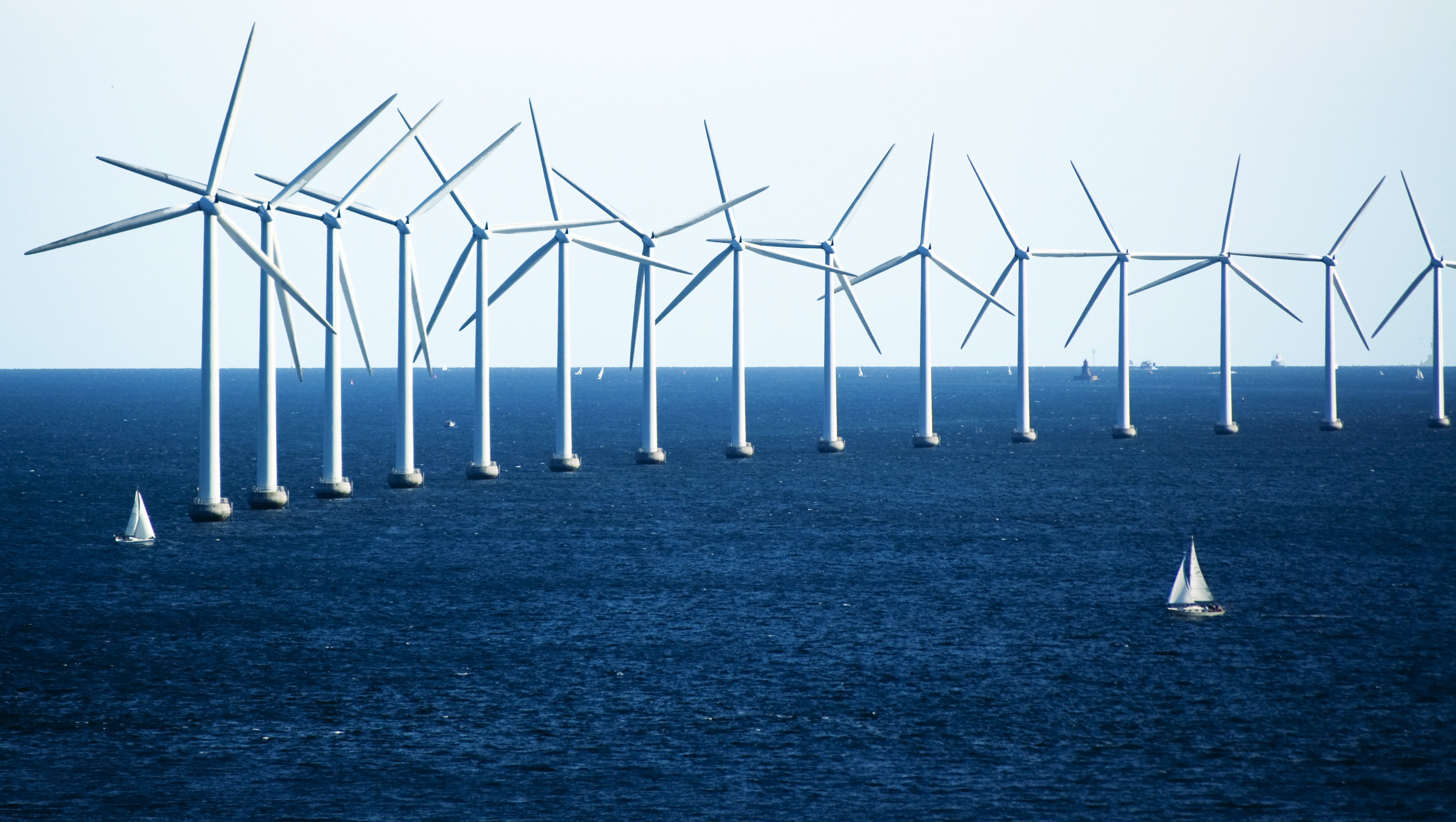 Windmills and Sailboats on the Ocean 4890300941