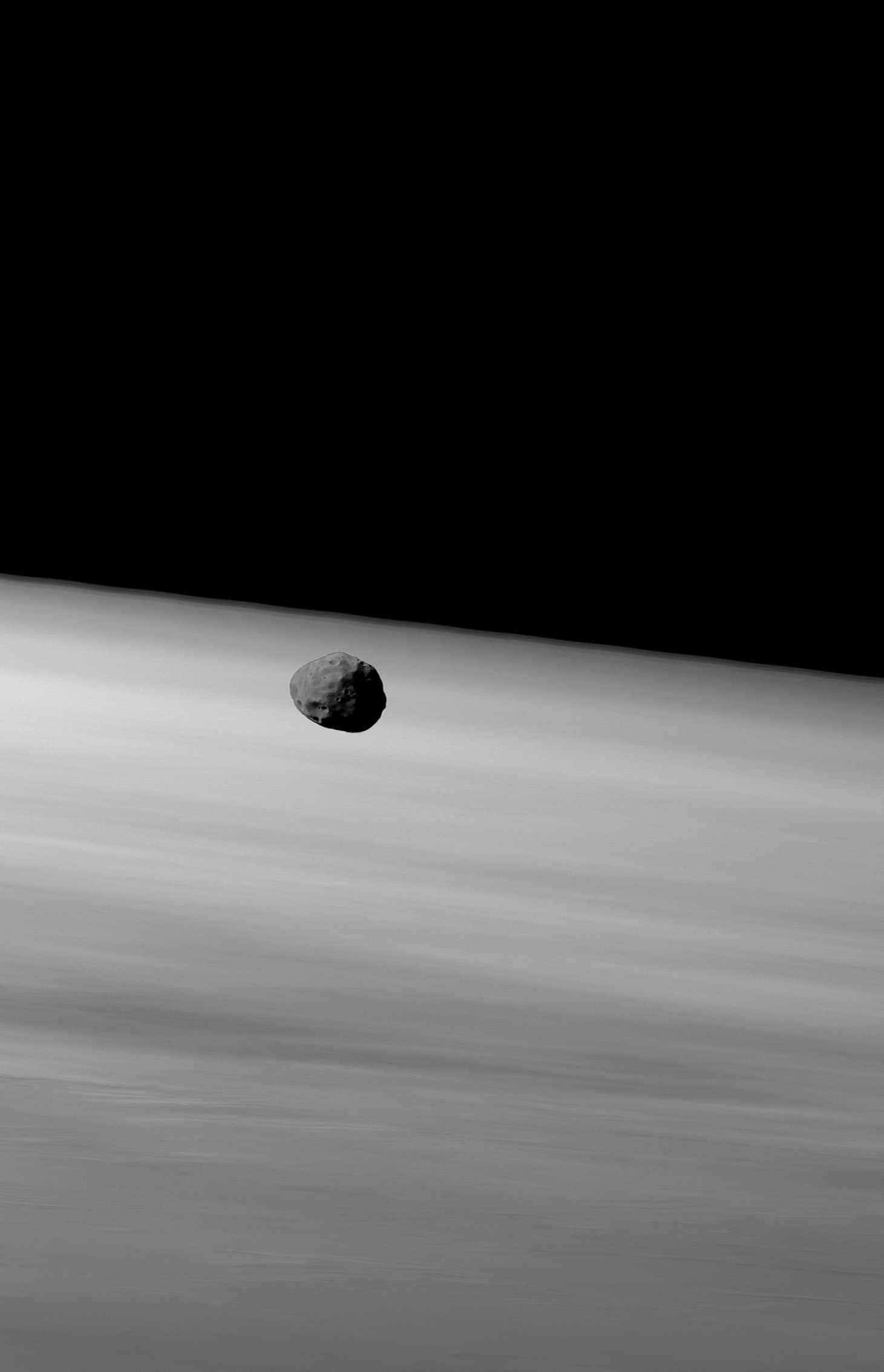 Phobos over Mars' limb by HRSC