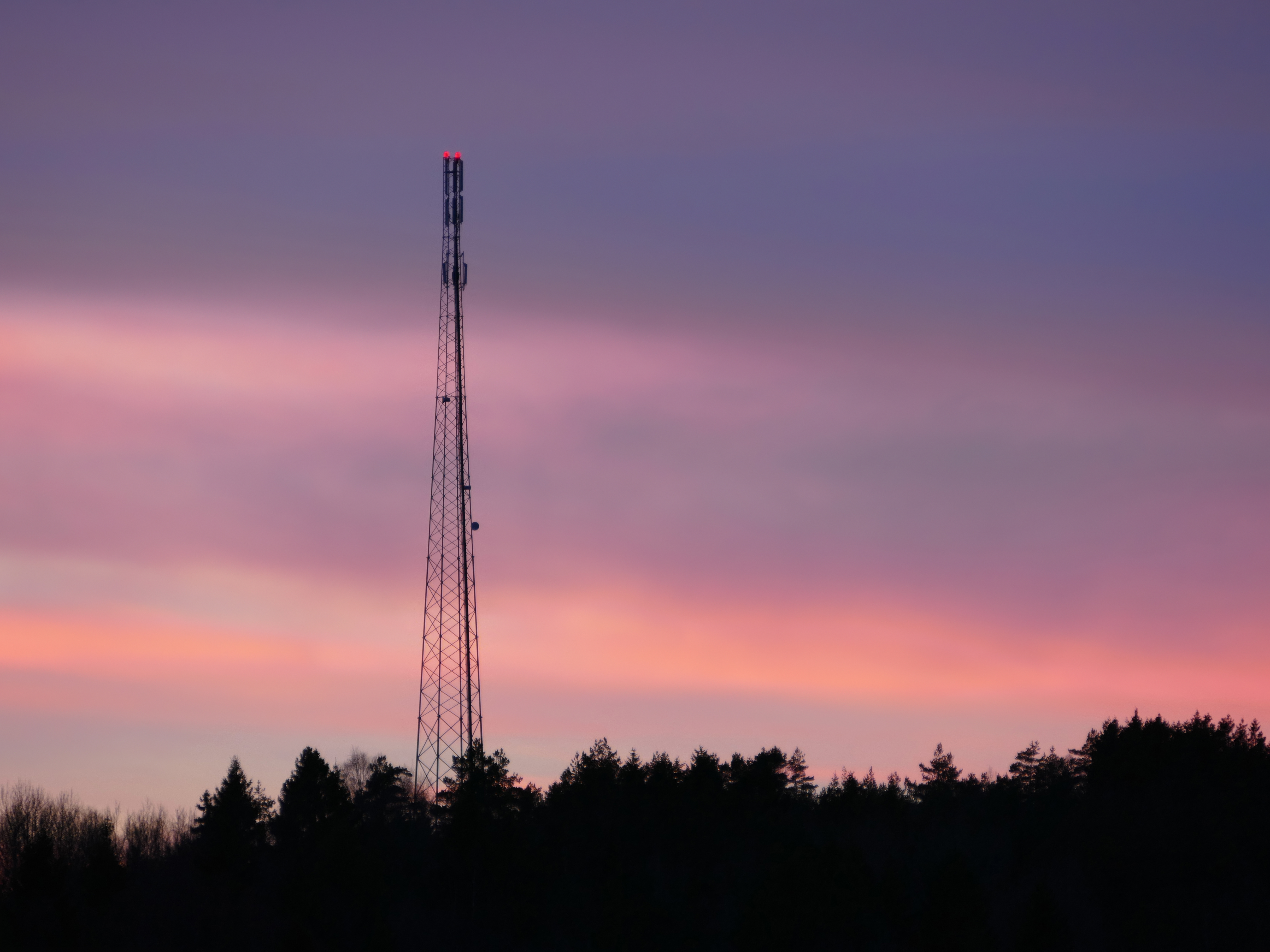Telecommunications mast at sunset
