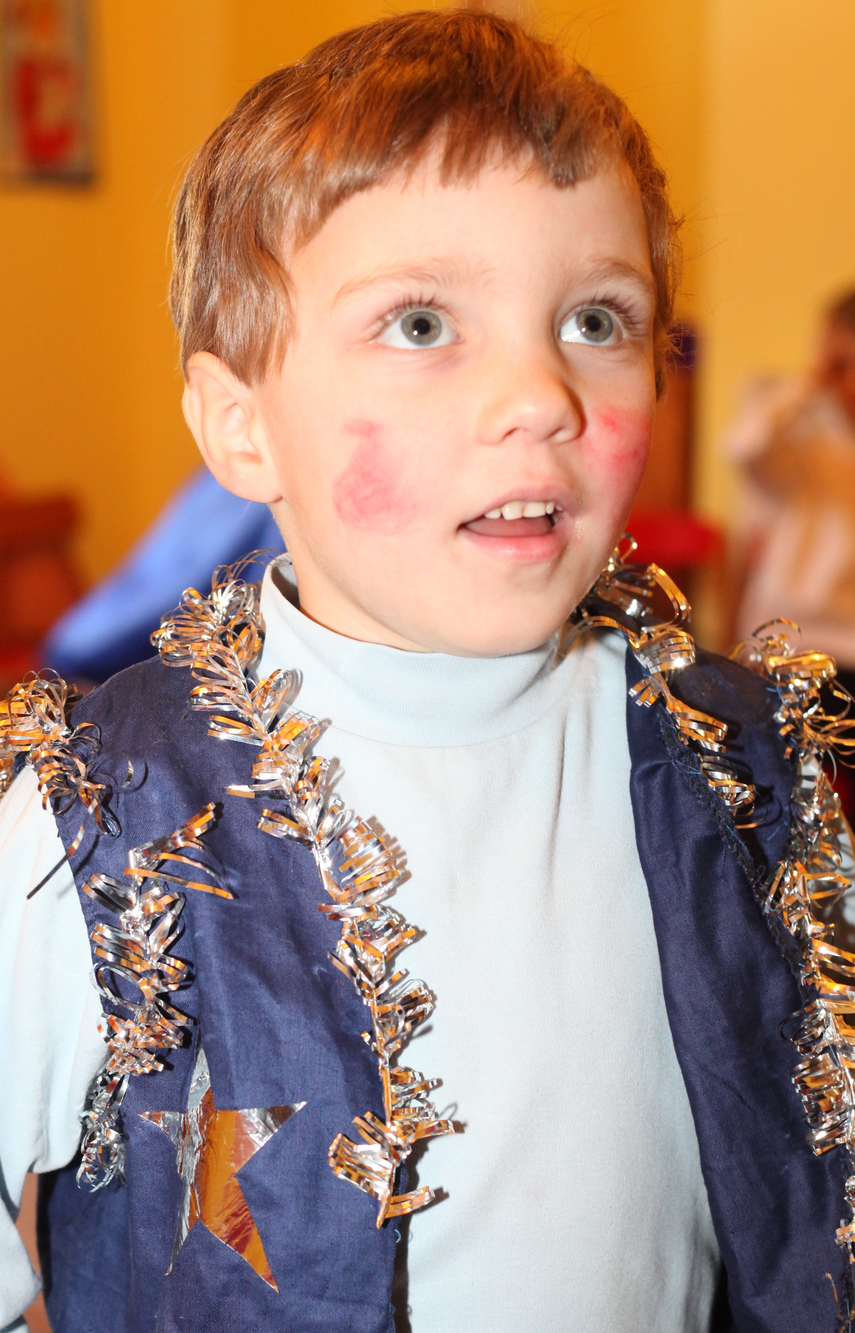a cute Catholic boy in a Catholic kindergarten