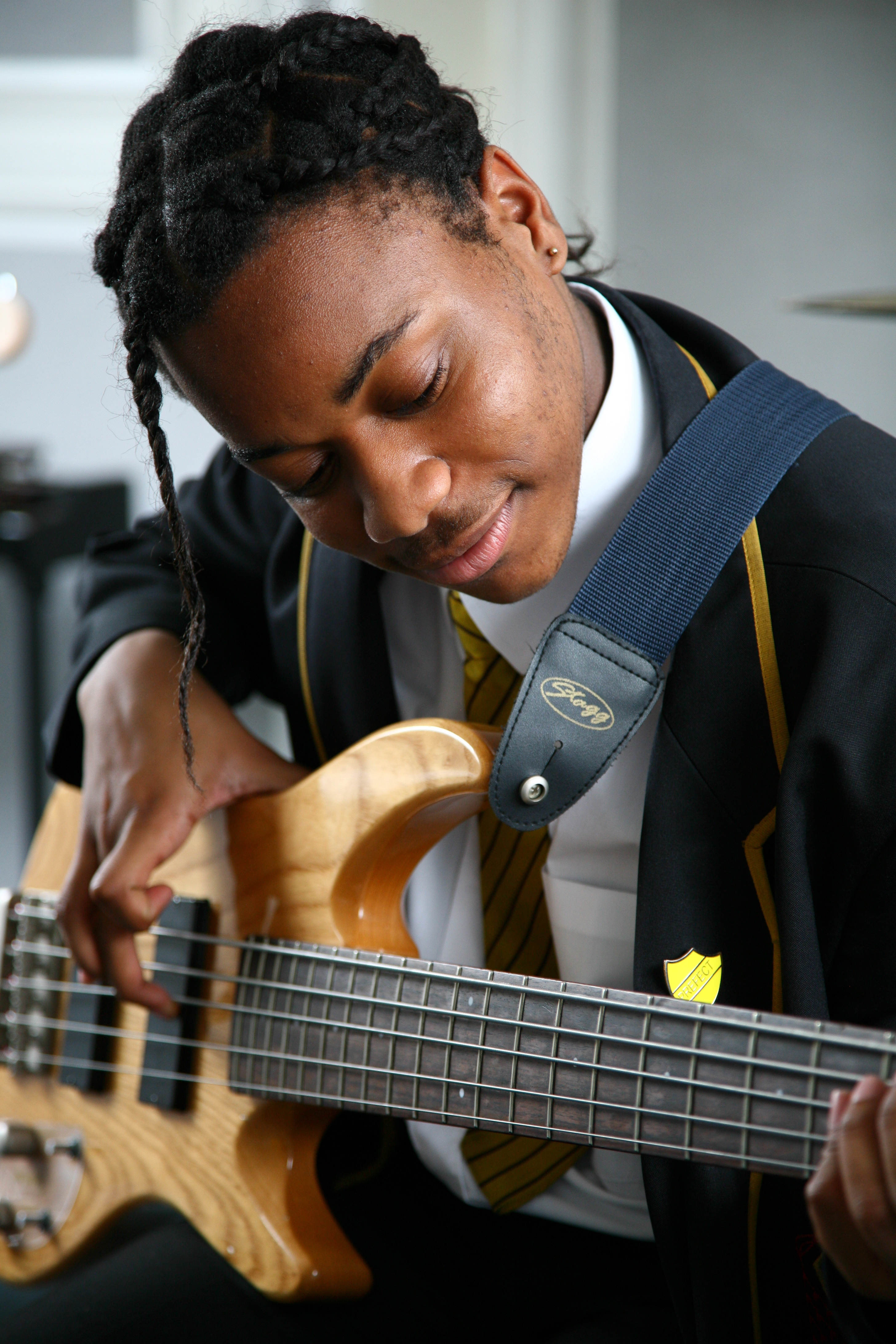 A student of St. Bonaventure's Roman Catholic Comprehensive School playing guitar