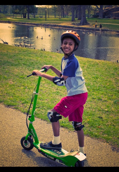 Boy on electric scooter 2425753939 dd4d6c1502 z