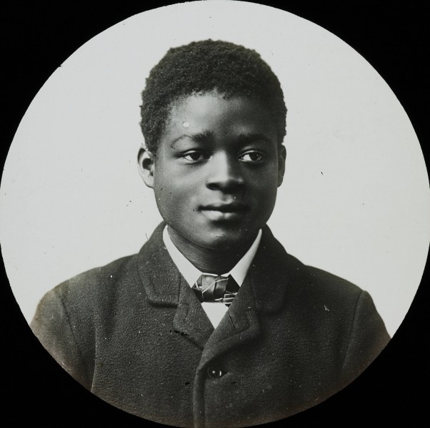 Boy with coat and tie, Congo, c. 1900-1915 (IMP-CSCNWW33-OS10-66)