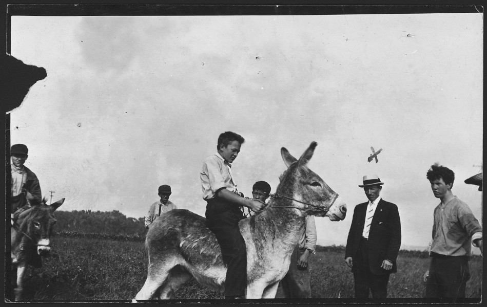 Boys riding donkeys - NARA - 285297