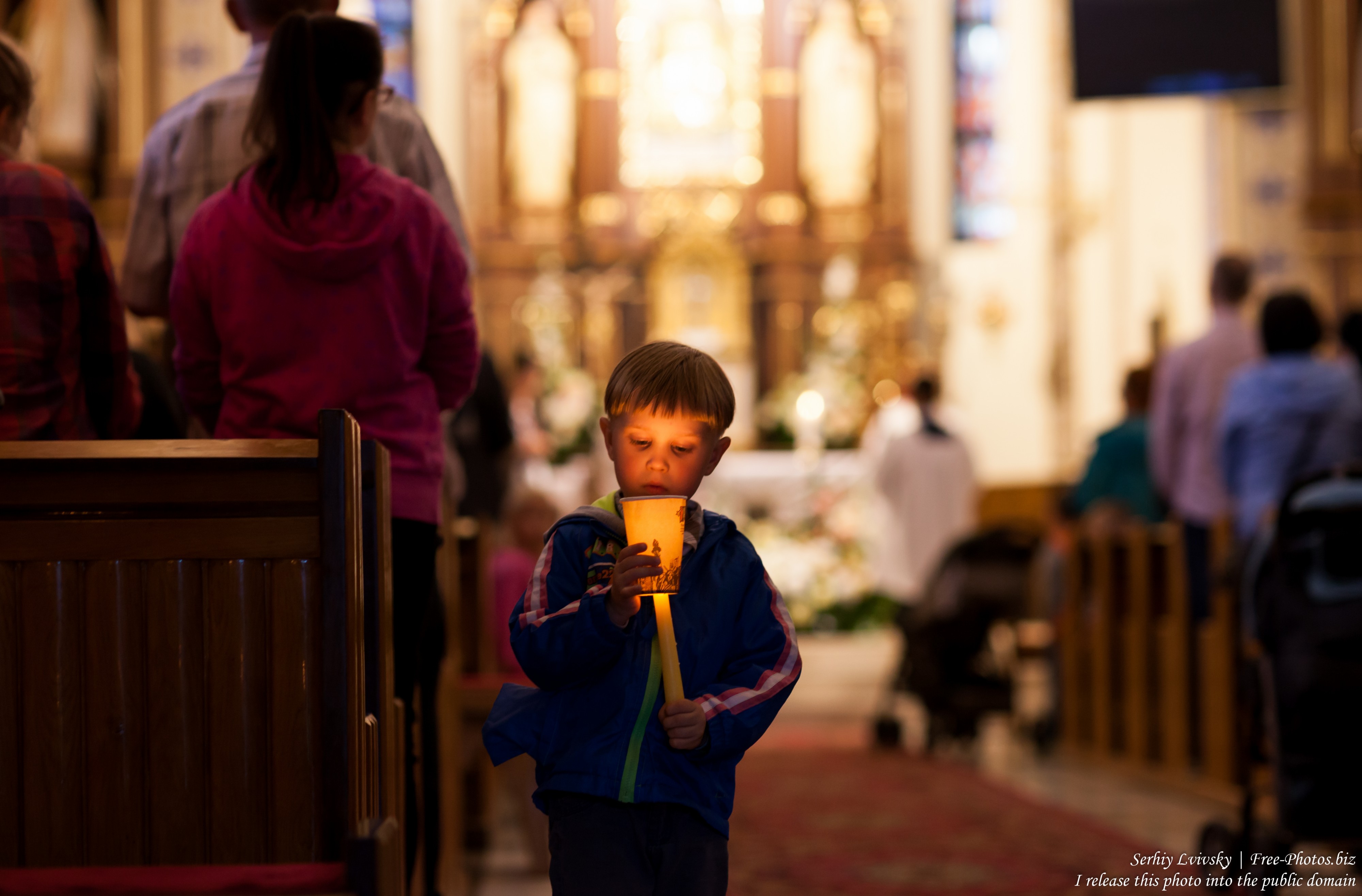 a 4-year-old boy at Catholic recollections in Poland in July 2017, picture 1