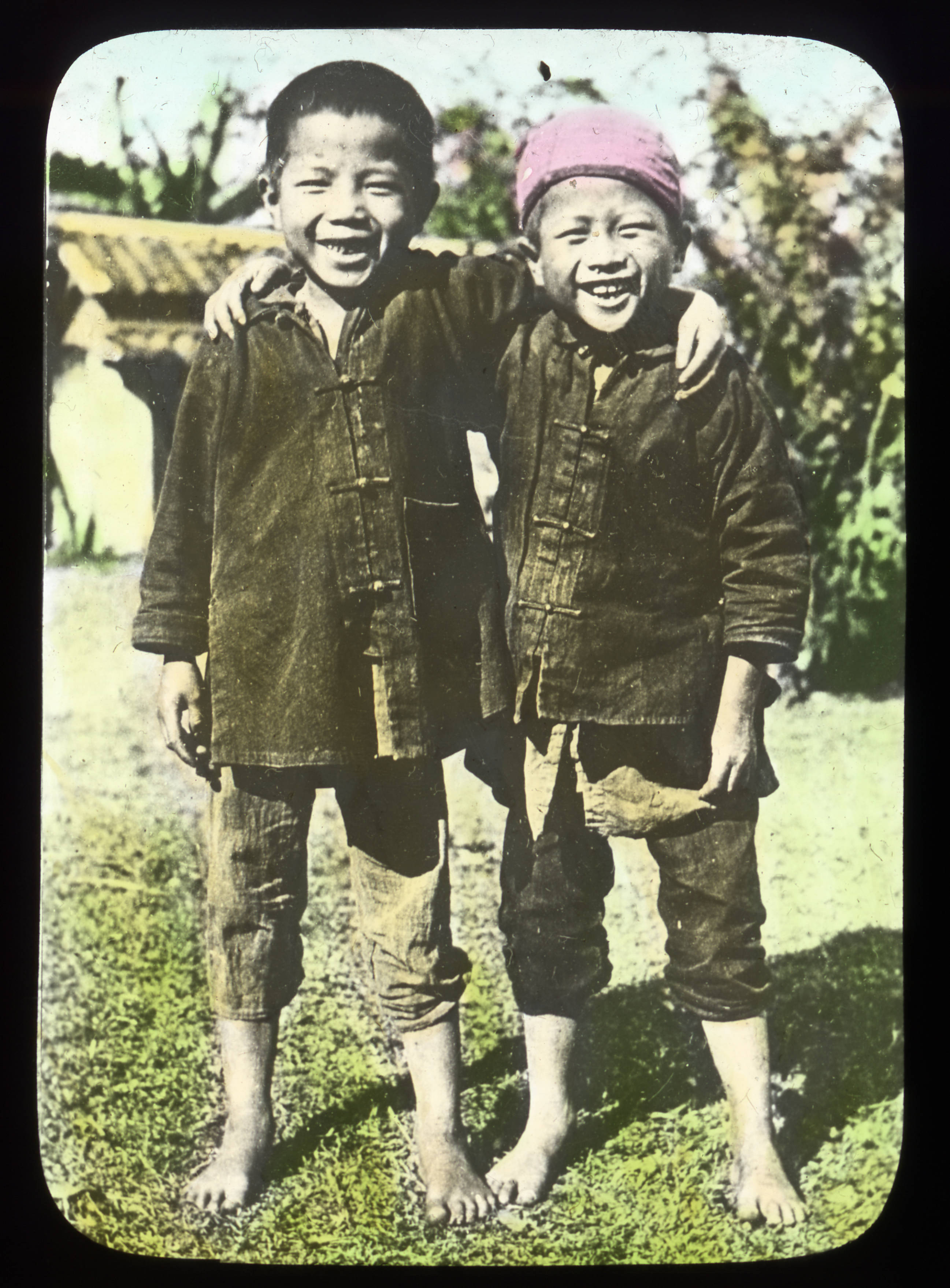 Two smiling boys with their arms over each other's shoulders, China, ca. 1918-1938 (MFB-LS0254)